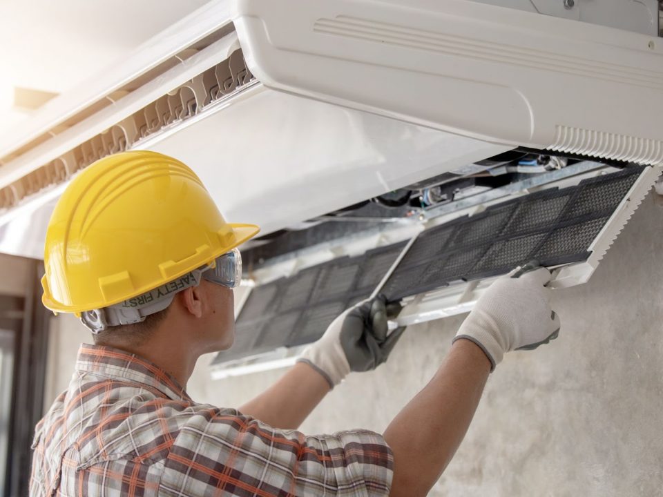 Man working on a HVAC system